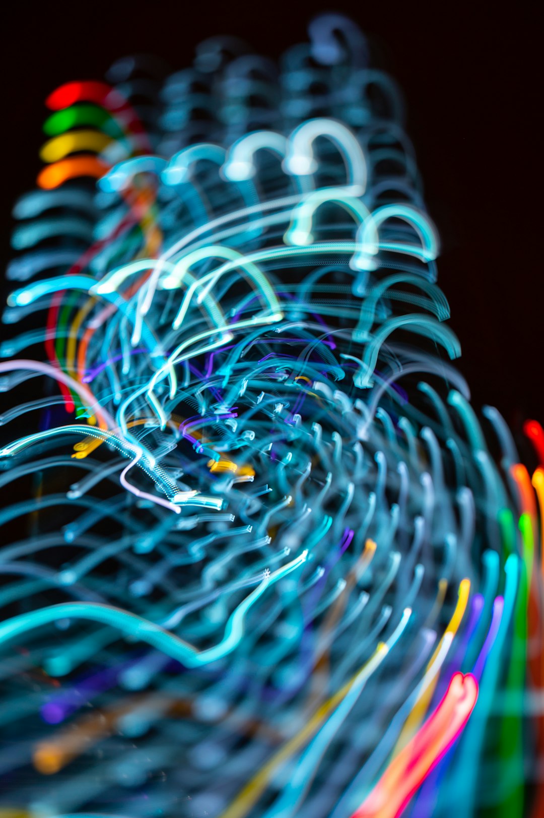 a-blurry-photo-of-neon-lights-in-the-dark-znk4fflrqjk